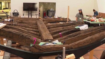 Relic boat being reassembled